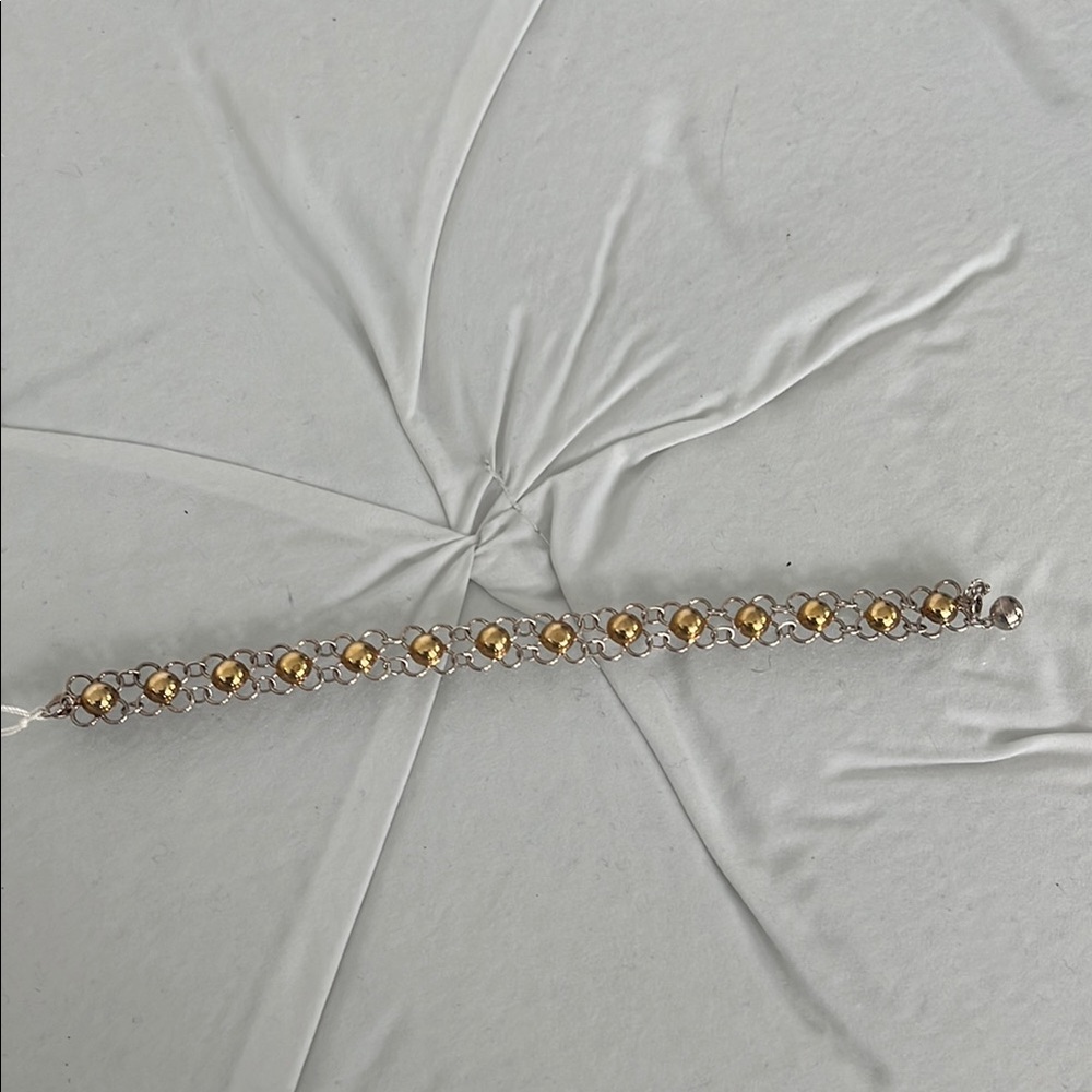 Elegant Gold and Silver Bracelet